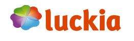 Luckia logótipo: caracteres laranja e um trevo de 4 folhas em verde, laranja, azul e lilás