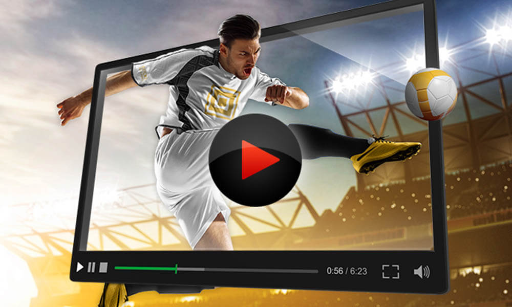 Jogador com equipamento Esc Online pontapeia uma bola, emoldurado entre um estádio e um botão de Play