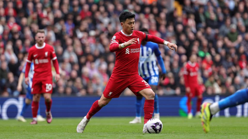 Liverpool s Wataru Endo in action during the Premier League match between Liverpool and Brighton and Hove Albion at Anfield, Liverpool, England on 31 March 2024. Editorialxusexonly DataCoxrestrictionsxapply Seexwww.football-dataco.com PUBLICATIONxNOTxINxJPN 248772126