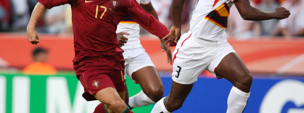 Cristiano Ronaldo of Portugal drives the ball during a FIFA World Cup soccer match against Angola June 11, 2006.