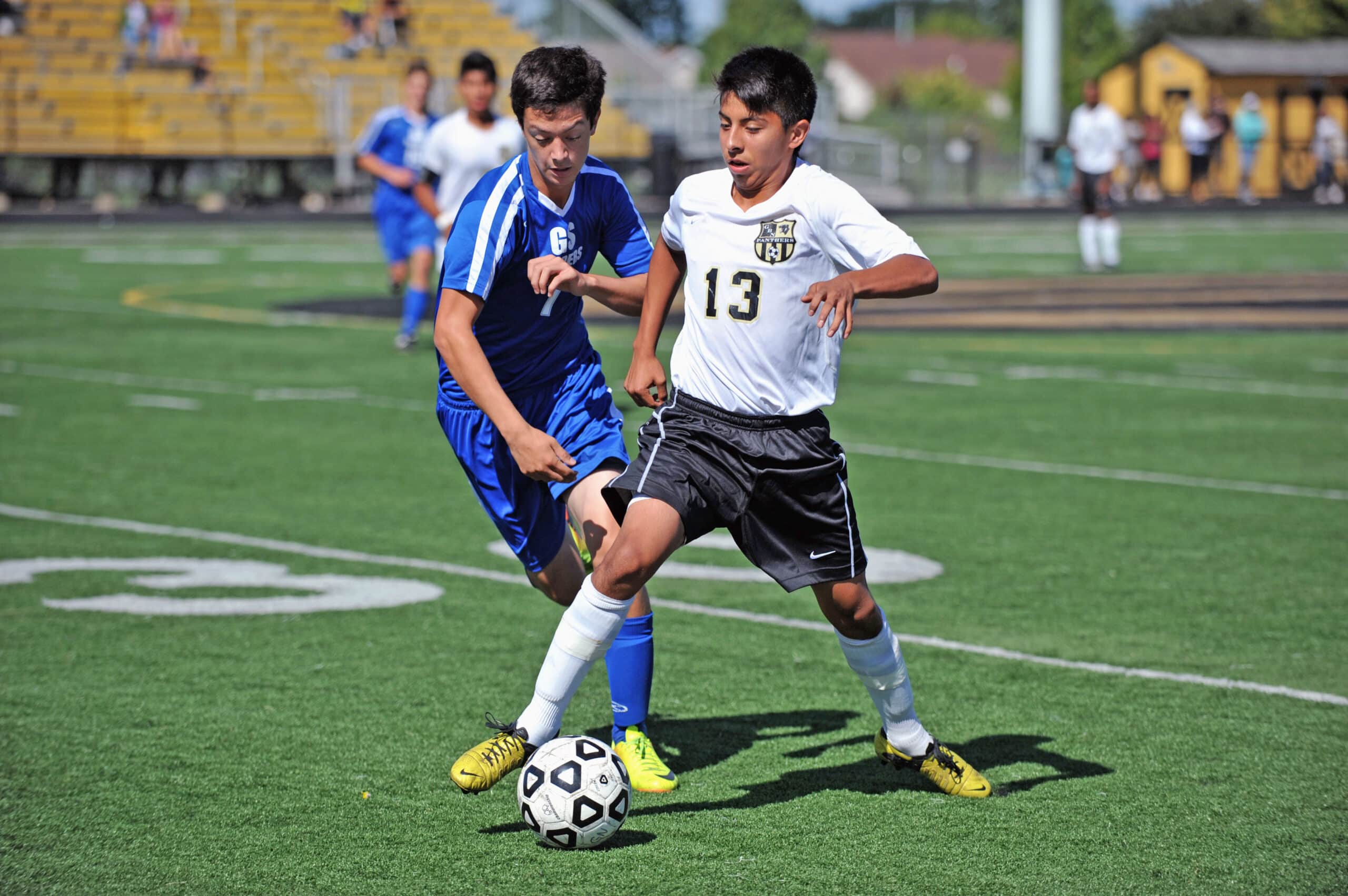 Sport Soccer Players battle for possession of ball. USA.